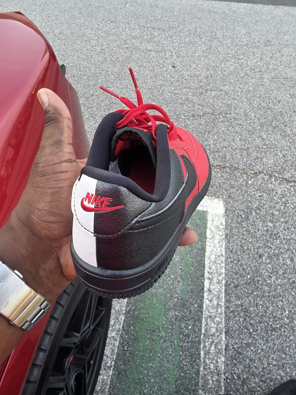 Nike Kids' Low-Top Sneaker in Red and Black